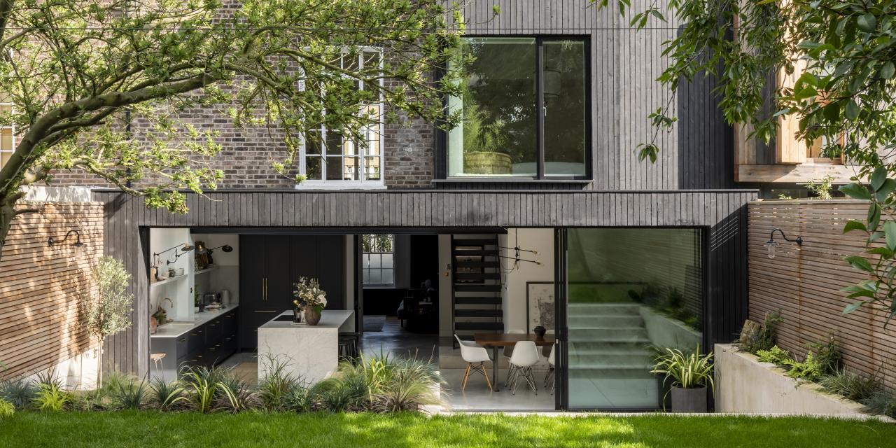 A Paul Archer Design residence exuding timeless elegance with reclaimed materials and warm, natural lighting